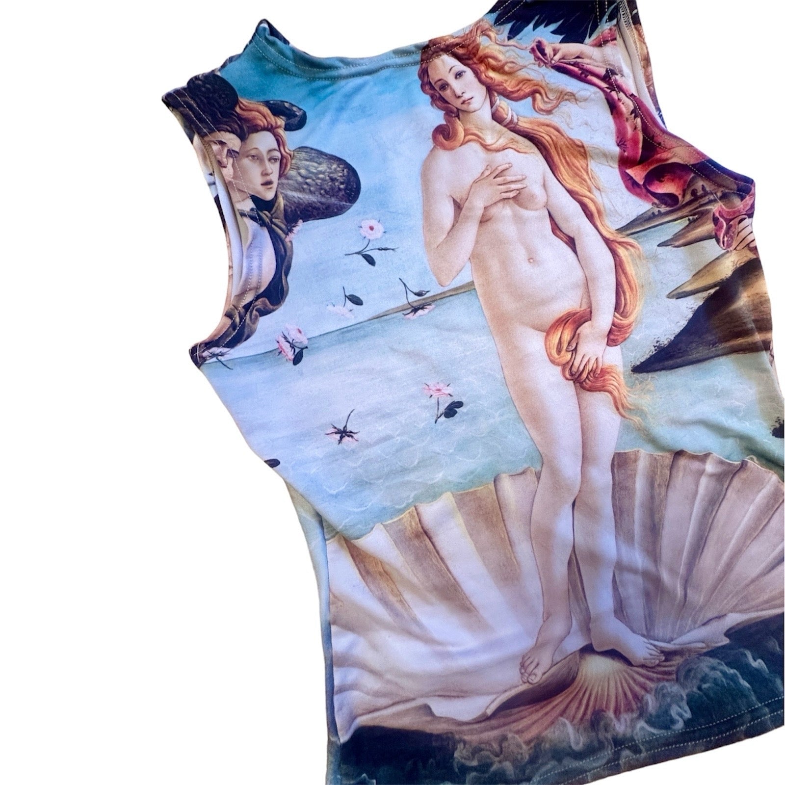 A multicolored tank top with a printed design of the Venus de Milo statue on a shell, set against a floral background.